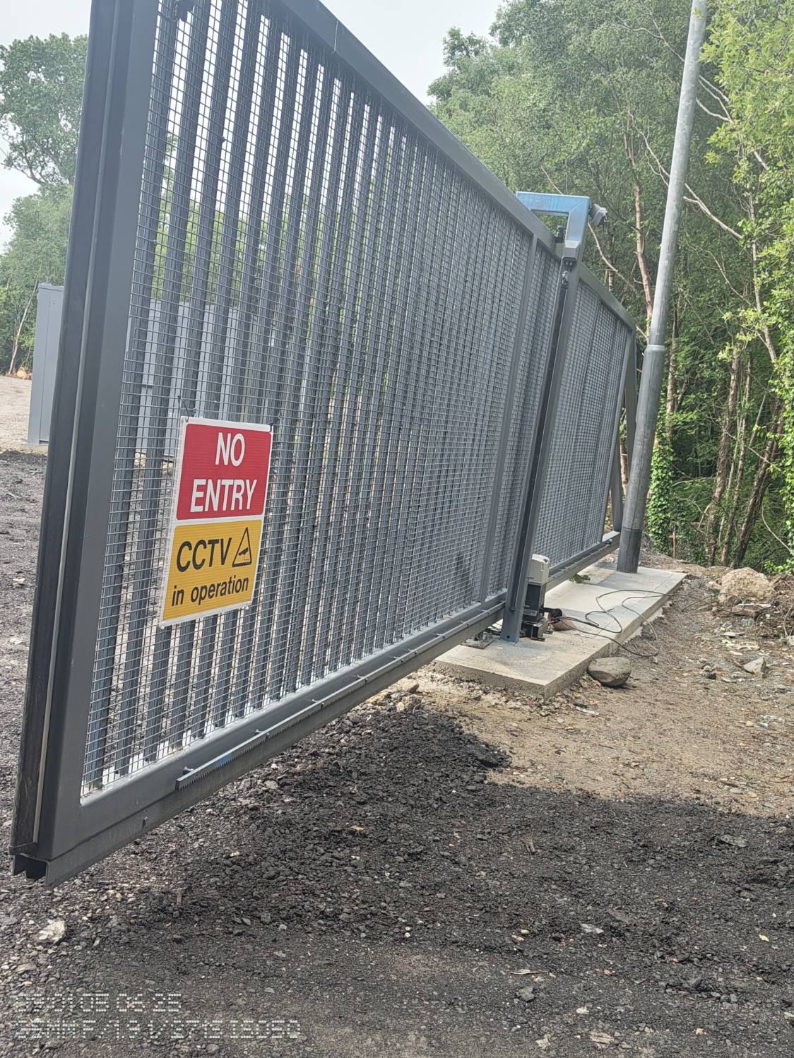 Automated sliding security gate installed by KMAC